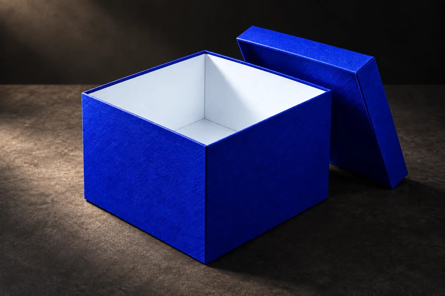 Concept image of an open emerald mystery box with an ivory interior